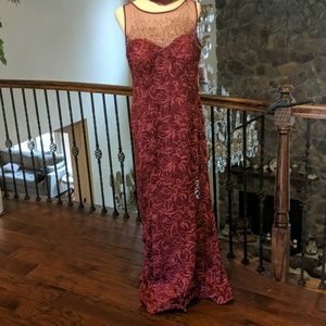 This a wine red Ignite Ball gown. Brand new w/ tag